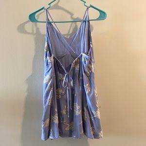 Blue dress with flowers embroidered and open back